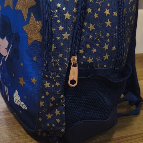 Must school backpack like new with three compartments and bottle holder