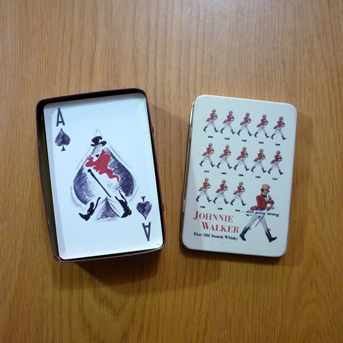 Johnnie Walker collectible playing cards like new in metal tin