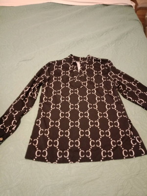 Women’s black and white shirt with nice buttons size M