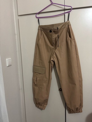 Leather pants new, size S, beige