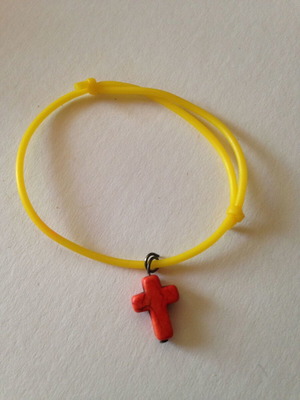 Bracelet with red cross used, yellow