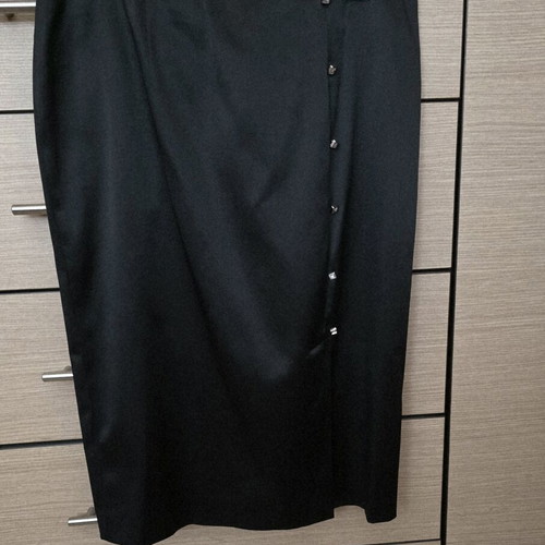 Bill Cost black satin pencil skirt used with decorative closures and slit