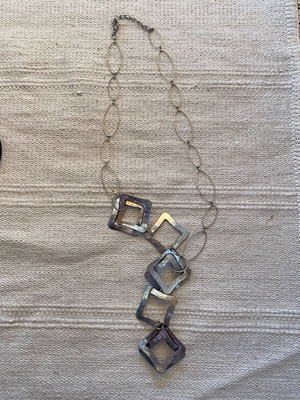 Necklace with metal shapes like new