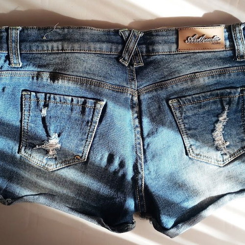 Denim shorts like new with worn details and patches, size S