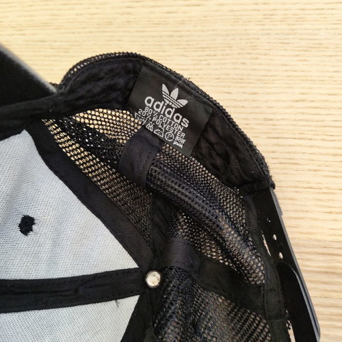 Adidas Originals black trucker cap with white trefoil logo