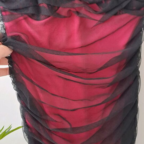 Draped evening dress like new, black outside, fuchsia inside, size S