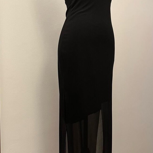 Elastic black dress with straps like new, subtle glitter