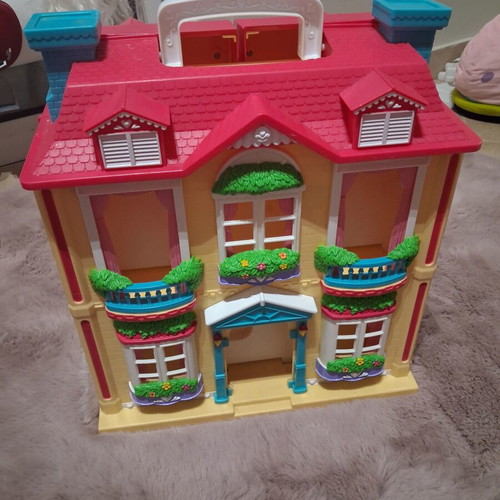 Vintage toy house with light used in good condition