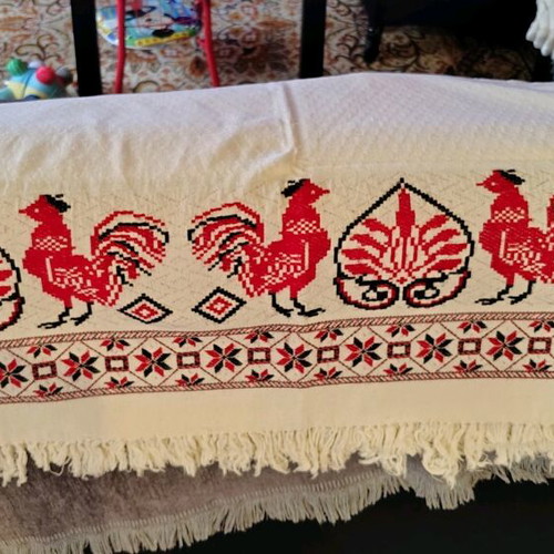 Table linens new, two large embroidered and one rectangular cloth