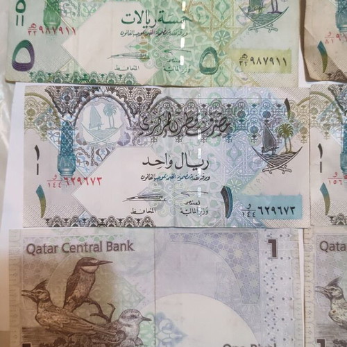 Qatar banknotes 5 pieces, one 5 Riyal and four 1 Riyal, mostly like new