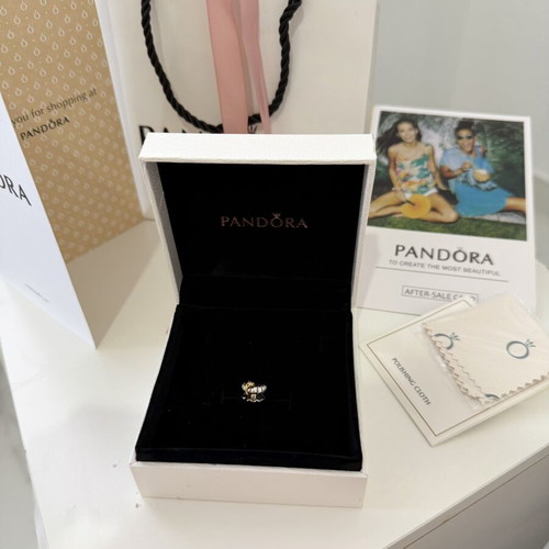 Pandora Ariel shell charm with diamond symbol