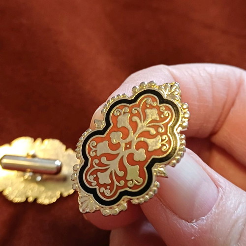 Orofix cufflinks used, vintage, embossed gold on coral background