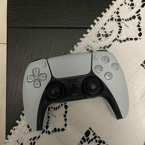 PlayStation 5 (PS5) console like new with 1TB storage and 2 wireless controllers