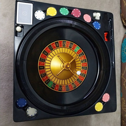 Roulette with cards, dice and chips like new, with case