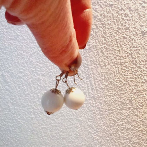 White hanging earrings used