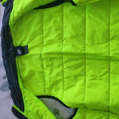 Nike sleeveless jacket like new, size 12-13