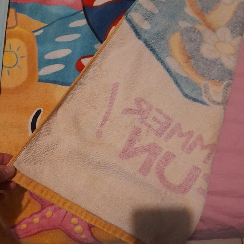 Beach towels like new, 2 large with vibrant colors