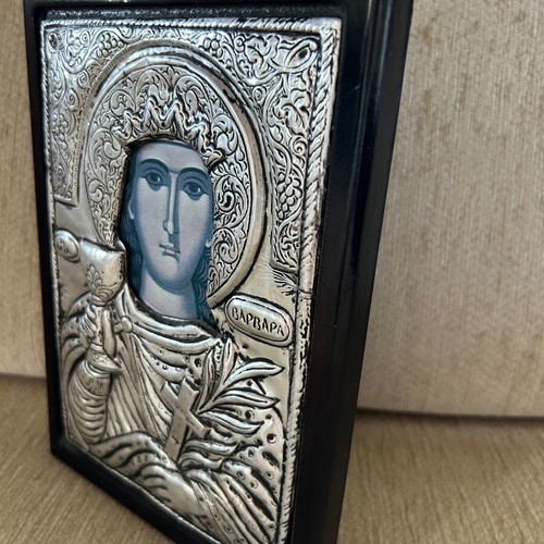 Religious icon used with metal overlay on wooden base