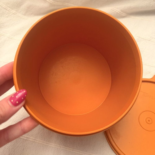Tupperwear vintage deep circle orange container with lid used