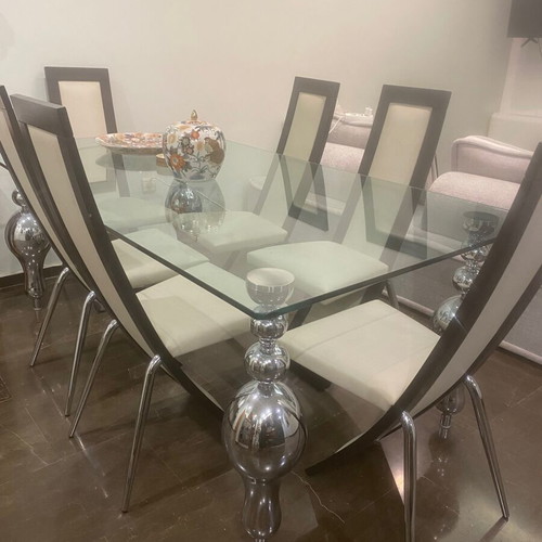 Glass dining table with 6 used Italian leather chairs, inox legs