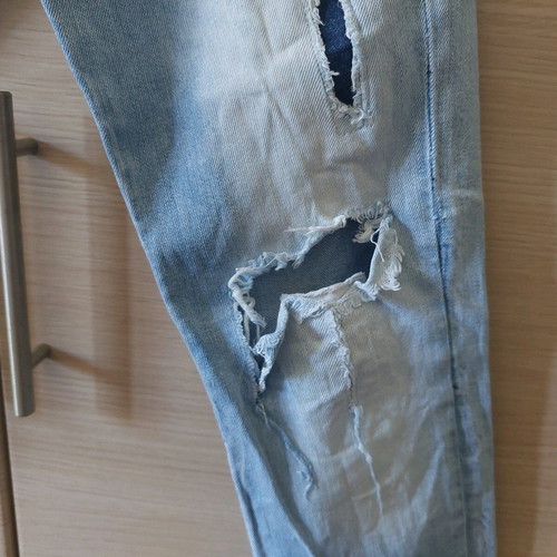 Attrativo light blue jeans with rips used, size 28