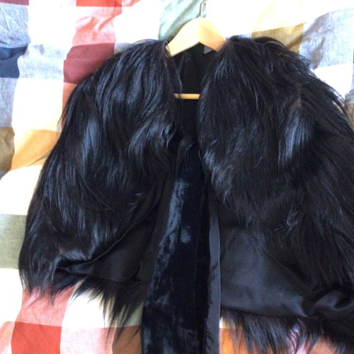 Vintage chimpanzee fur cape with satin lining and velvet ribbons