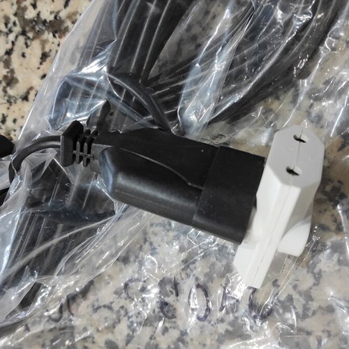 Black bipolar extension cord 10m with male and female plugs and 3-way adapter, new