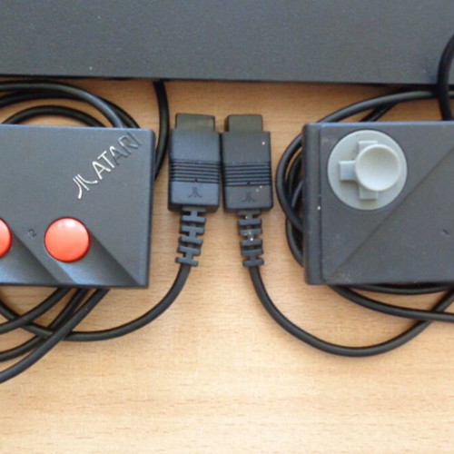 Atari 2600 Jr. console used with 32-in-1 cartridge and controllers