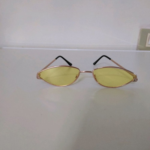 Sunglasses used with yellow lens and lightweight frame