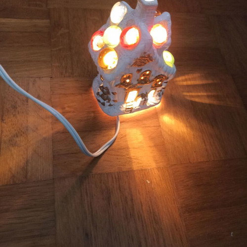 Small white church-shaped lamp with multicolor lights like new