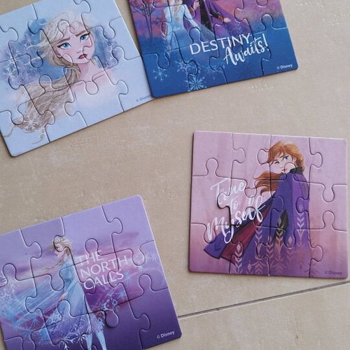 Elsa and Anna puzzles set of 4, like new, 12 pieces each