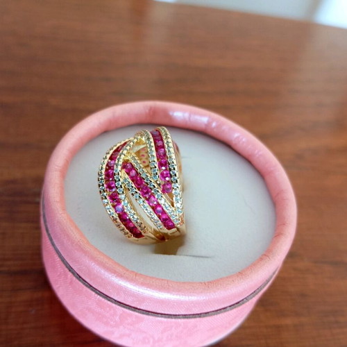 Ring gold plated with pink and gold zircon stones, size 7 new