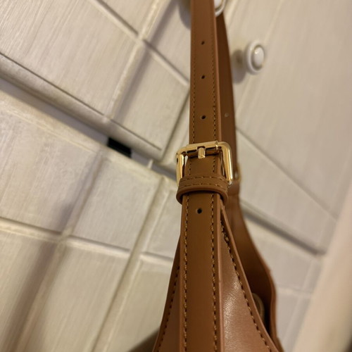 Nolah shoulder bag in camel and brown with monogram design