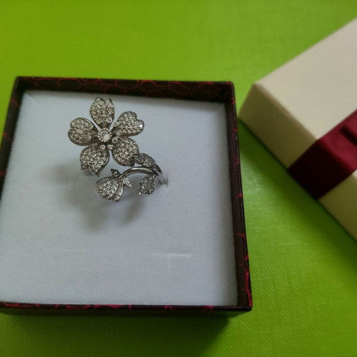 Silver 925 ring used, resizable, flower design