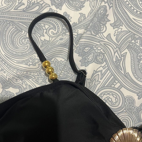 Swimwear top black with gold details new, covers M and L sizes