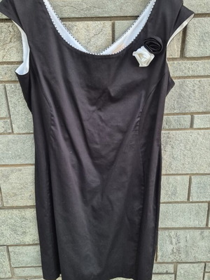 Black sleeveless dress with decorative flowers
