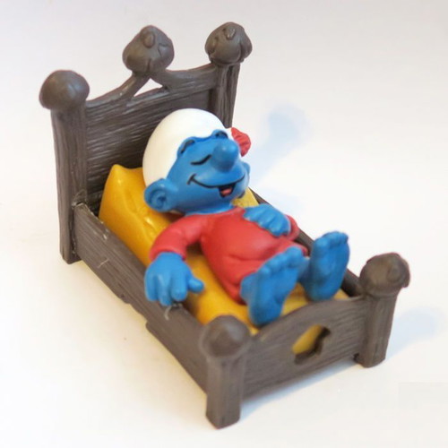 Smurf in bed like new, Schleich 5.5cm figure