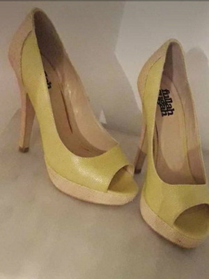 Yellow high heels used, size 39, branded