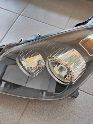 Opel Astra H left headlight genuine, used, electric