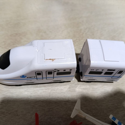 Plastic helicopter and train figures used