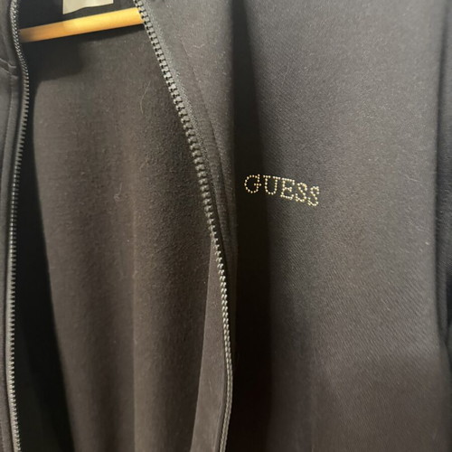 Guess women's black zip-up sweatshirt size L like new