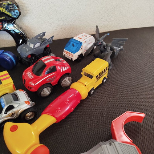Set of children's action toys and toy cars