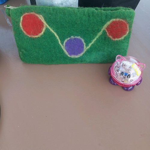Wool pencil case and sharpener like new, pack