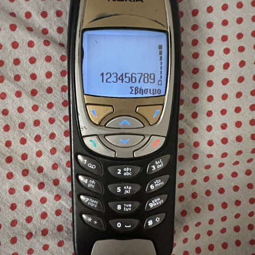 Nokia 6310i used with charger, gold color