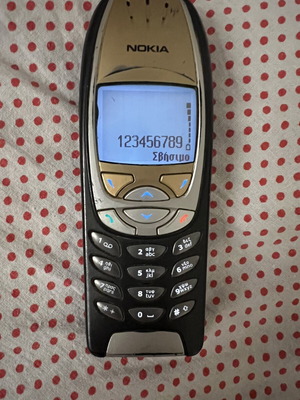 Nokia 6310i used with charger, gold color