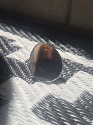Adjustable ring like new, brown