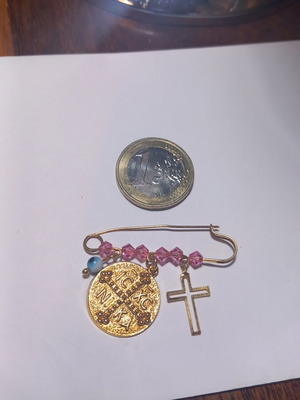 Silver gold-plated safety pin with pink crystals and charms
