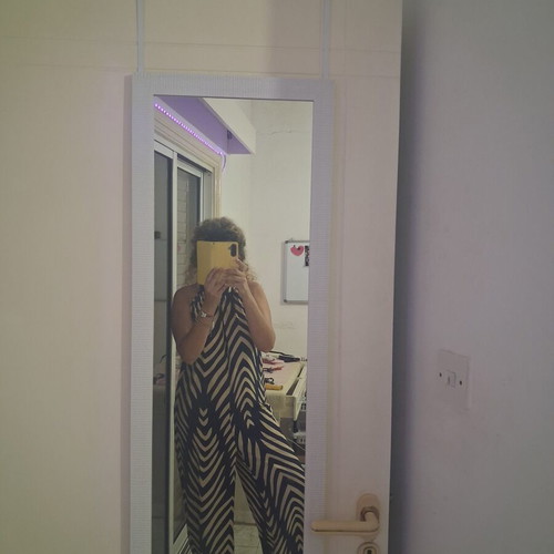 Shein jumpsuit with navy blue and beige zebra pattern, size M