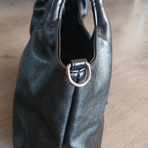 Handbag new with strap, black synthetic leather