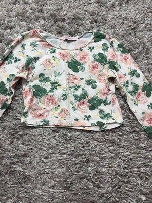 Women's crop top blouse with floral pattern used, size S